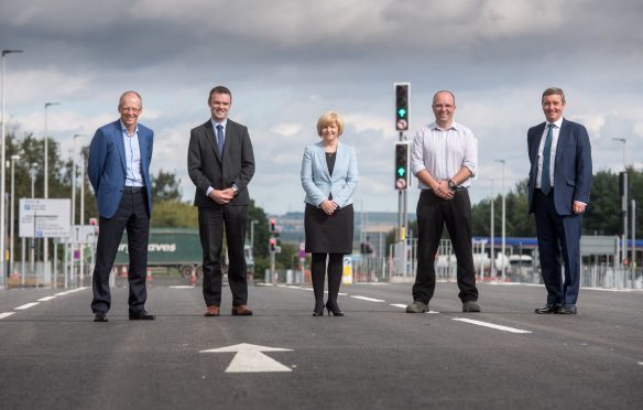 Aberdeen, Monday 29th August 2016

New road opening near Dyce International Airport. 

Pictured is L toR: David Milloy, Ben Dempster , Cllr Jenny Laing, Colin Howard, Archie Blair

 
Picture by Michal Wachucik / Abermedia