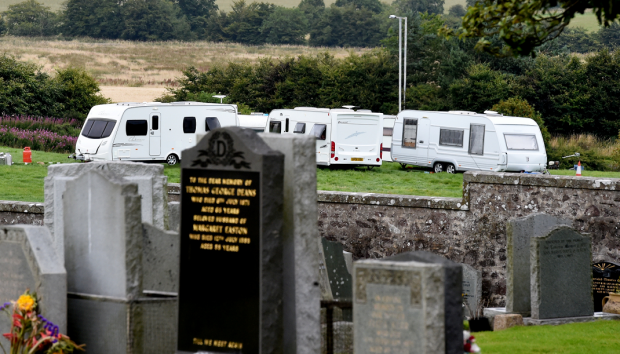 Travellers have set up close to the graveyard