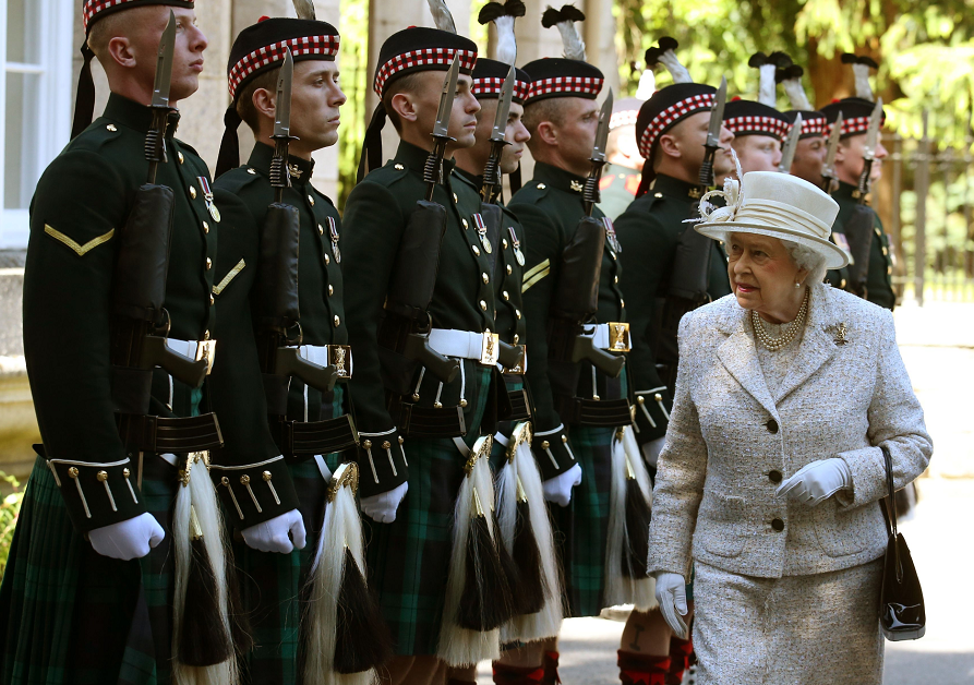 Queen Elizabeth II inspects the 2nd Battalion Royal Highland Fusiliers  The Royal Regiment of Scotland at the gates of Balmoral as she takes up her summer residence.