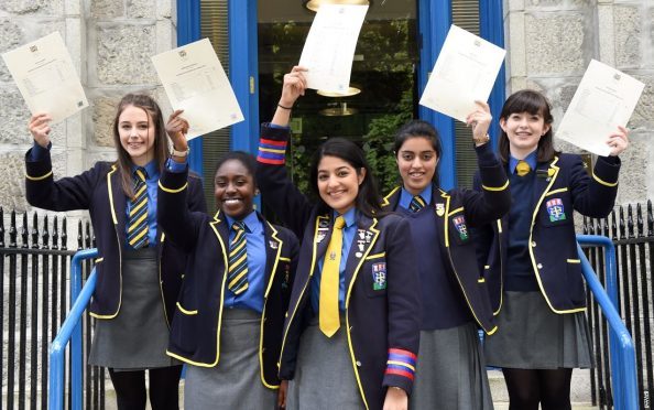 St Margaret's School pupils Keren Lumsden, Meene Otakoro, Ayesha Pasha, Nida Wani and Emily Owen who all scored A's in their exams. (Picture: Kevin Emslie)