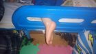 Young Travis McGhee's foot became stuck in his plastic bed