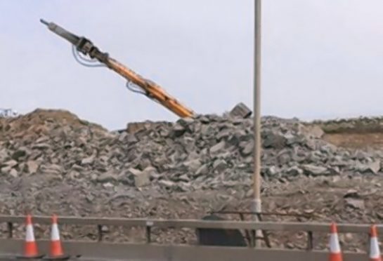 The incident emerged as photographs were released by workers on another section of the road, which showed an overturned digger on the A90 at Charleston.