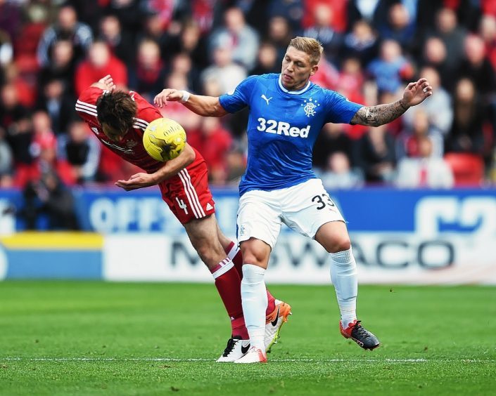 Rangers' Martyn Waghorn (R) and Aberdeen's Andrew Considine
