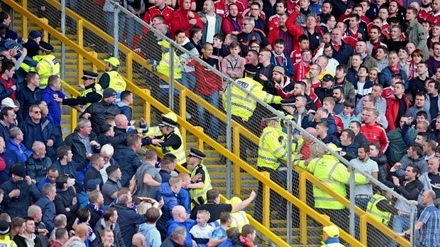 The police separate both sets of supporters