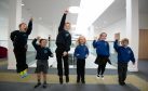 Pupils jump for joy in their new school
