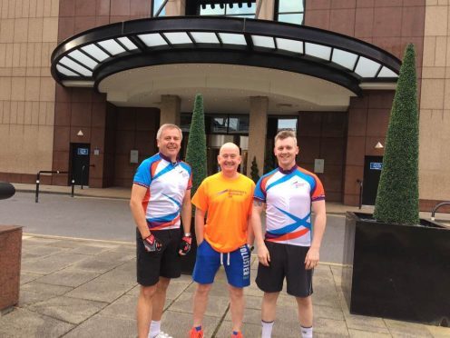 Left to right: David Robertson, Michael Gaffney and Johnny Yule cycled from Glasgow to Edinburgh to raise money for Alzheimer’s Research UK
