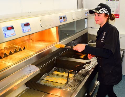 Elise Boothroyd preparing another fish supper at the Fochabers Fish Bar.