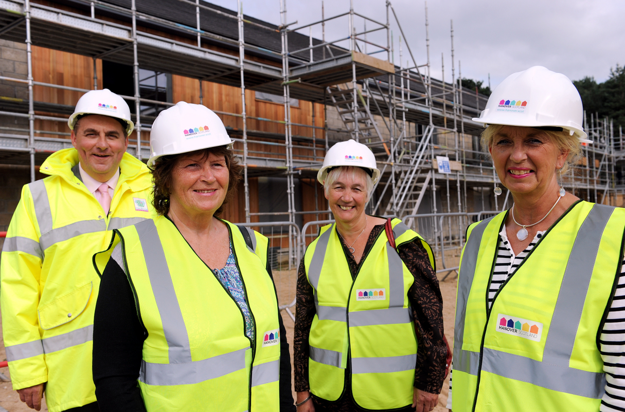 The new complex is on track to open in July. Pictured: Elgin councillor, James Allan, Lorna Cresswell, chairwoman Moray Integrated Joint Board for Health and Social Care, Alison Petch, Hanover board, and Helen Murdoch, chief executive Hanover Housing.
Picture by Gordon Lennox.