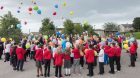 Pupils loose balloons at the school