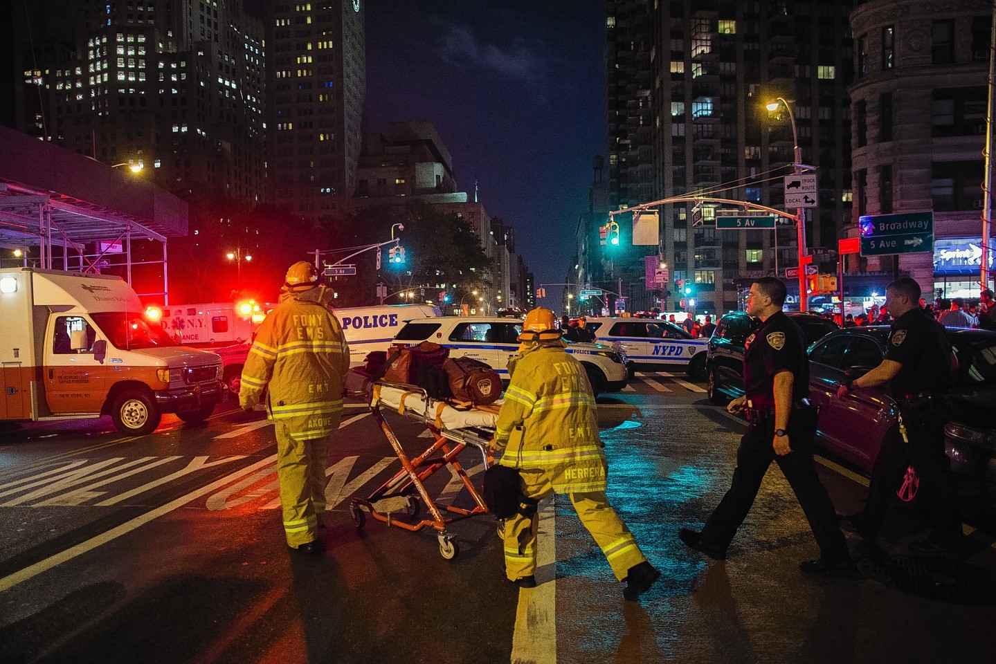 Police and firefighters work near the scene 