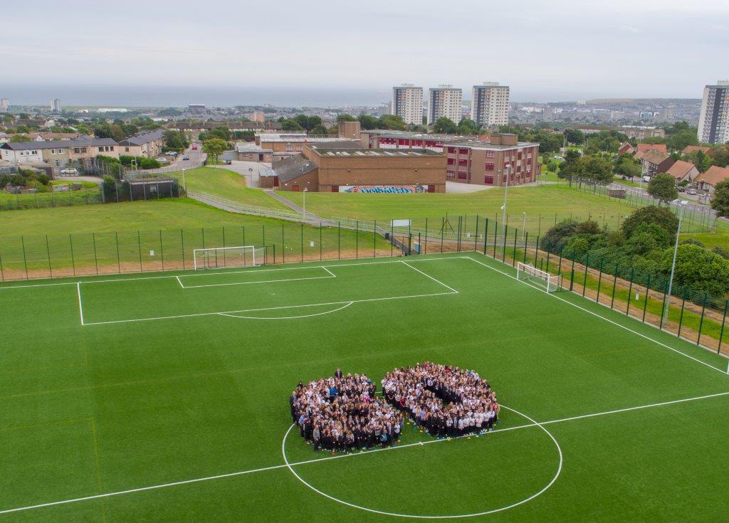 Pupils and staff formed a giant 60 in the school's playing fields.