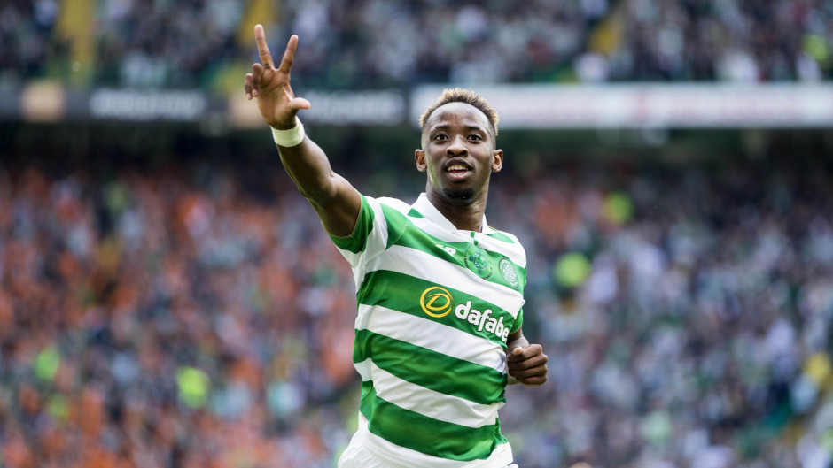 Moussa Dembele celebrates his hat-trick as Celtic comfortably saw off Rangers