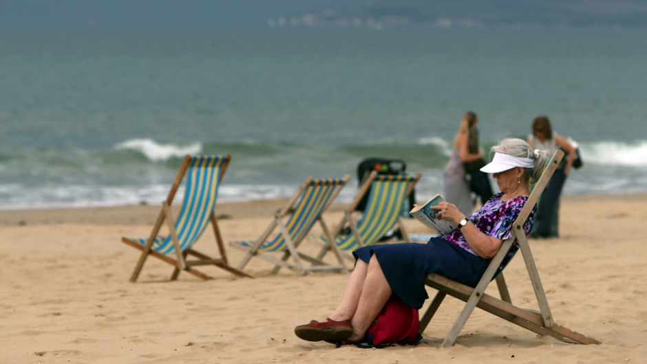 People enjoy the sun in Dorset.