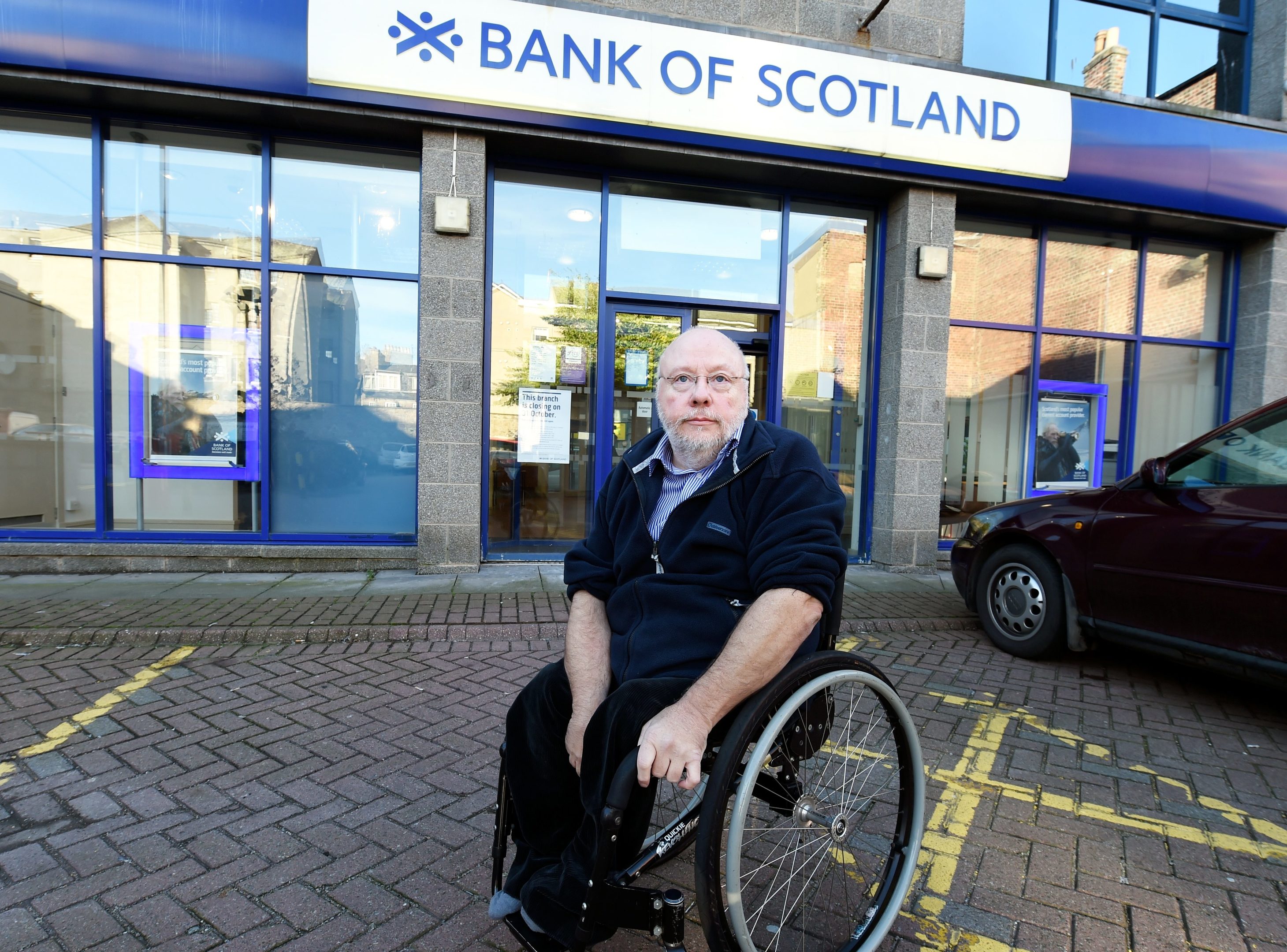 The Bank of Scotland/Halifax at John Street, Aberdeen, is closing at the end of the month with other branches not wheelchair friendly. In the picture is wheelchair user, Ron Holding at the bank. 
Picture by Jim Irvine  30-9-16