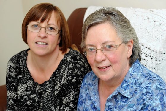Widow Maryan Whyte (right) with her eldest daughter Sharon Robertson at her home in Forres.
Picture by Gordon Lennox