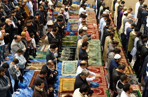 Muslims in prayer at the Aberdeen Beach Leisure Centre. (Picture: Jim Irvine)