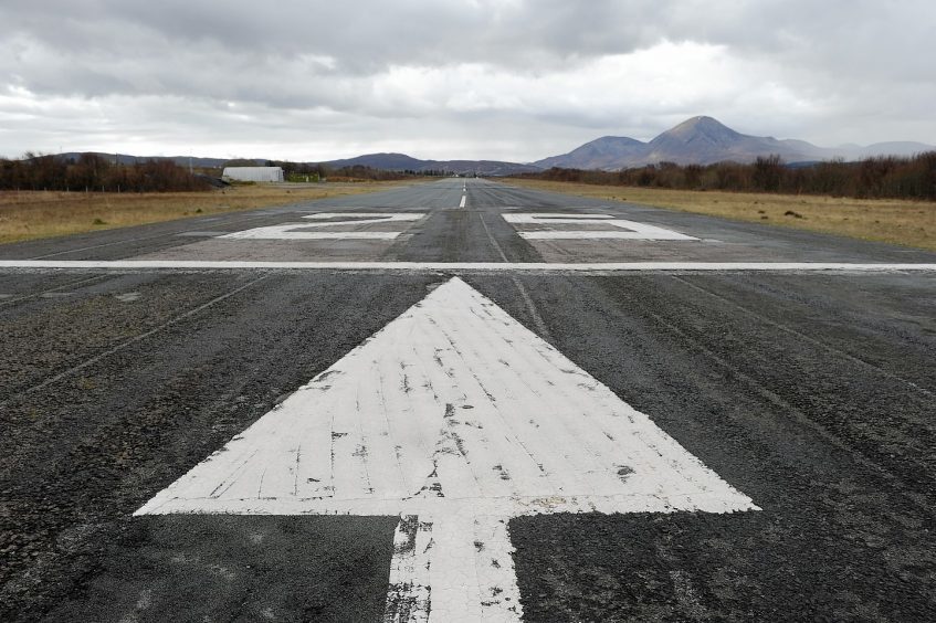 Skye Airstrip with a long arrow on the flat tarmac. 