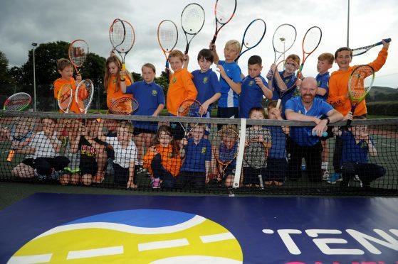 Rothes tennis club members still upbeat in spite of Judy Murray not  coming.
Picture by Gordon Lennox