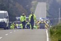 Road closed as cabin destroyed