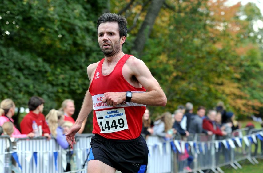 Winners of the half marathon for men Iain Reid, Cambuslang Harriers.