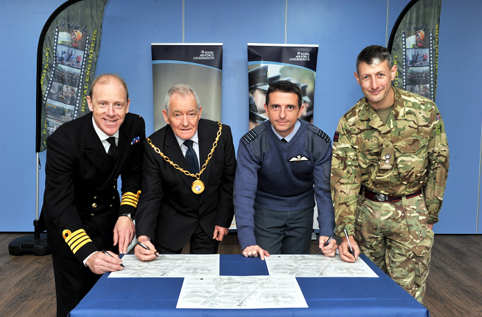 Signing of the Armed Forces Covenant at RAF Lossiemouth.  L-R: Capt Chris Smith, RN, Naval Regional Commander Scotland and Northern Ireland, Allan Wright, Convenor of Moray Council, Group Captain Paul Godfrey, Station Commander RAF Lossiemouth, and CO of 39 Engineers (Air Support) Regiment, Lt Col Jim Webster.
Picture by Gordon Lennox 06/10/2016