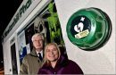 Councillor Ian Mollison with Melanie Torrance of the Newtonhill Village Association at Newtonhill Pharmacy where one of the loaned defibrillators is placed.   
Picture by Kami Thomson