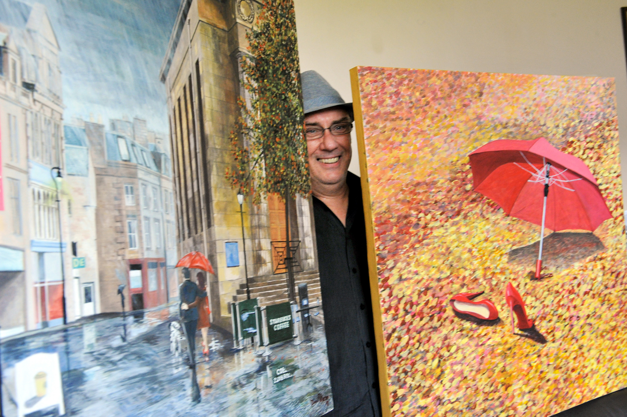 Artist, David Paterson, with paintings inspired by the Two Red Shoes dance hall to be displayed at his exhibition in The Gallery, Elgin Library. Picture by Gordon Lennox