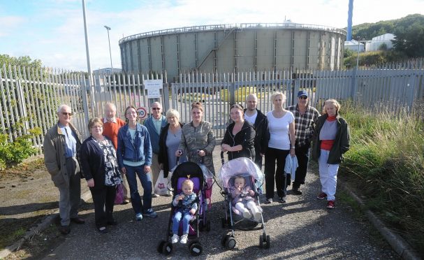 Protesters outside the proposed site of the development