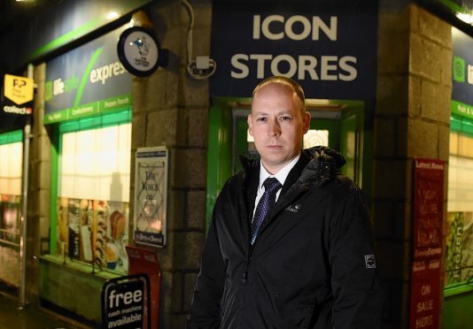 DI Lee Jardine outside the Aberdeen store