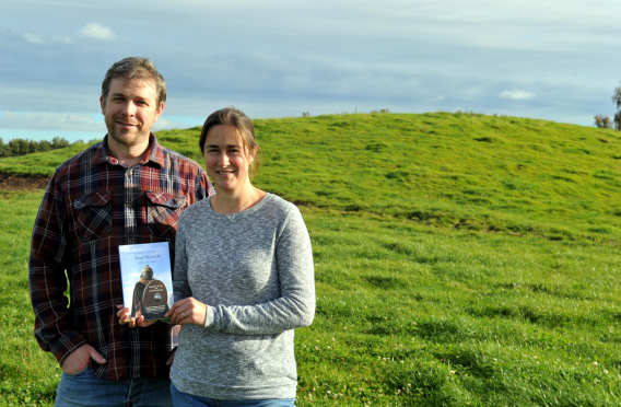 George and Karen Sutherland on Macbeth's Hillock near Brodie.