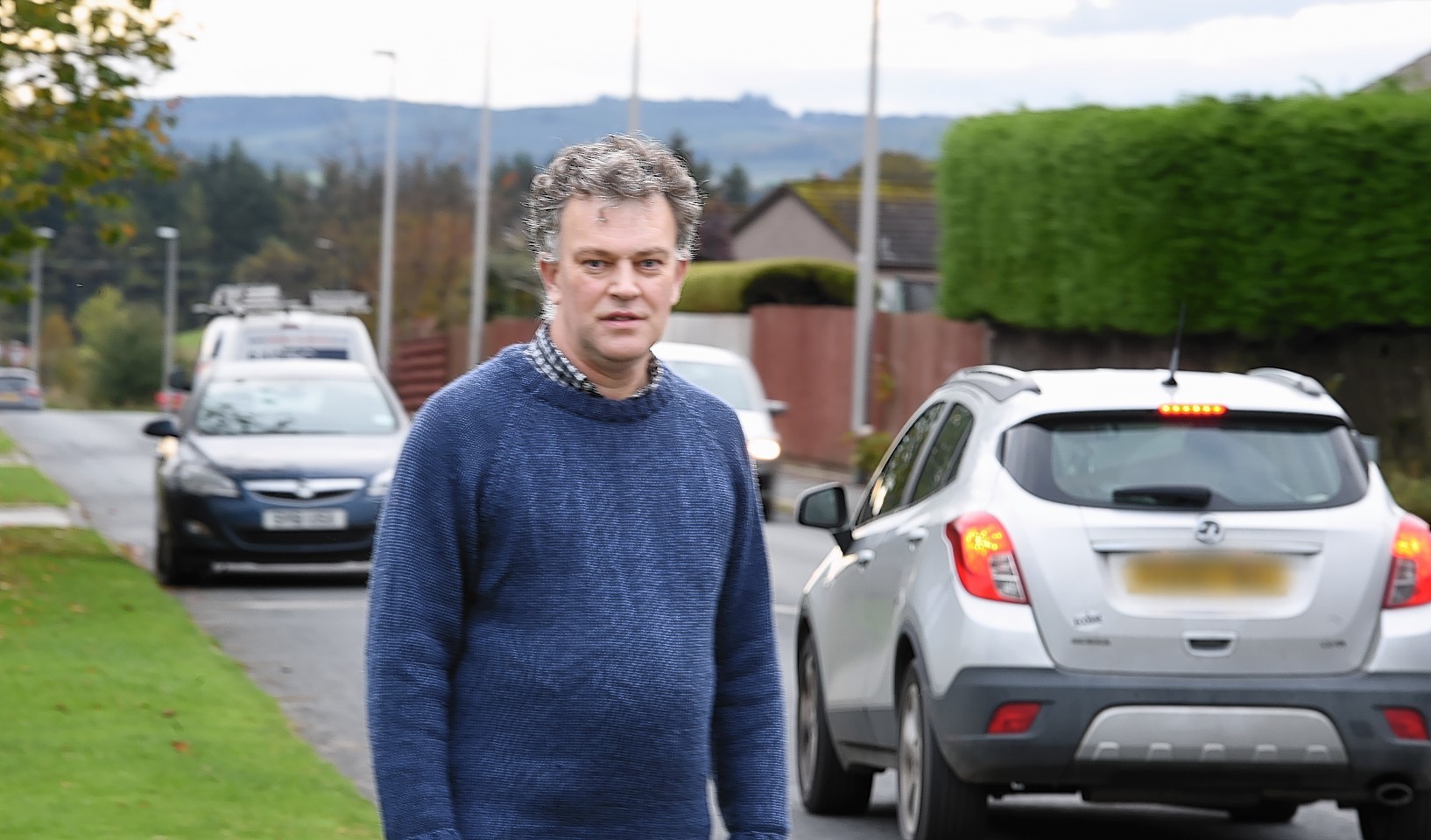 Councillor Martin Ford, at Hillbrae Way, Newmachar, where there is a 'severe' speeding problem