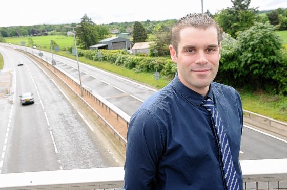 Mike Burns on a bridge above the A9