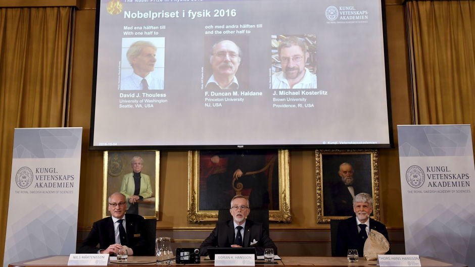 The Royal Academy of Sciences members announce the winners of the Nobel Prize for physics (AP)