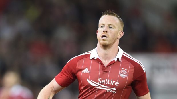 Adam Rooney: On target for the Dons in a one-sided Scottish Cup encounter.