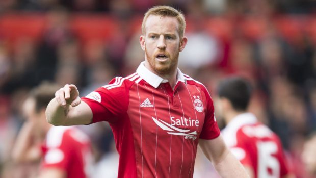 Adam Rooney scored a hat-trick for the Dons