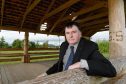 Highland Councillor Ken Gowans in the vandalised pavilion in Inshes Park