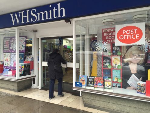 The installation of automatic doors at a relocated post office has been delayed by up to a month.