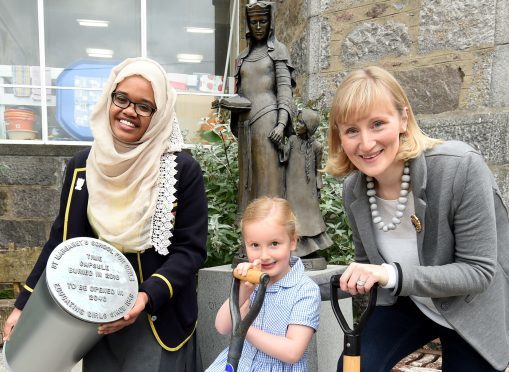 Halima Elyas, head girl, Emily Littlejohn, 1st year pupil and Fiona Littlejohn, former pupil president.
Picture by Jim Irvine.