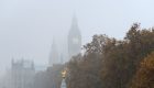 Big Ben in London, is seen through thick fog.