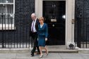First Minister Nicola Sturgeon leaves after a meeting between Prime Minister Theresa May and the leaders of the three devolved governments at 10 Downing Street