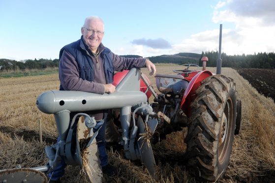 Sandy Allison of Lairg with his 1958 Ferguson Tractor and same vintage disc plough. Pics by Sandy McCook