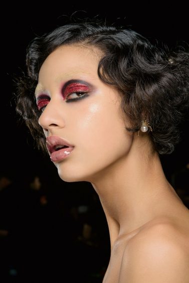 Model backstage at Charlotte Olympia AW16 wearing MAC make up.