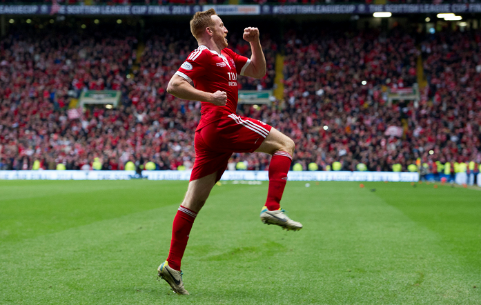 Aberdeen hero Adam Rooney celebrates his winning penalty
