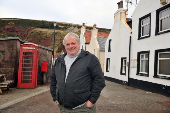 Baden Gibson with the famous telephone box