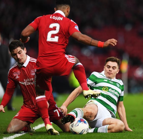 Celtic's James Forrest and Aberdeen's Shay Logan and Kenny McLean in action