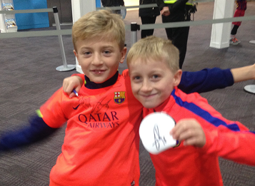 FC Barcelona fans Leo Conway(R) and Callum Adamson(L) waited at Glasgow airport to meet the palyers at Glasgow airport