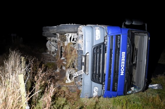 A road traffic collision (RTC) a lorry flipped on to its side into a field on the B993 Whiterashes to Inverurie.
Picture by KENNY ELRICK