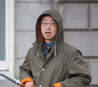 Conrad Chau outside court in Aberdeen