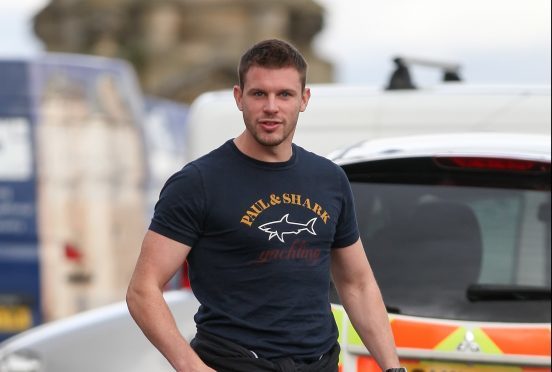 David Wallace outside Inverness Sheriff Court for a previous hearing into an assault charge in 2016. Image: DC Thomson