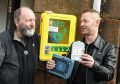 (from left) Stonehaven and District Community Council's Phil Mills-Bishop with John Trudgill from Baker Hughes who have donated four defibrillators to Stonehaven, one of which is now operational in the Market Square.